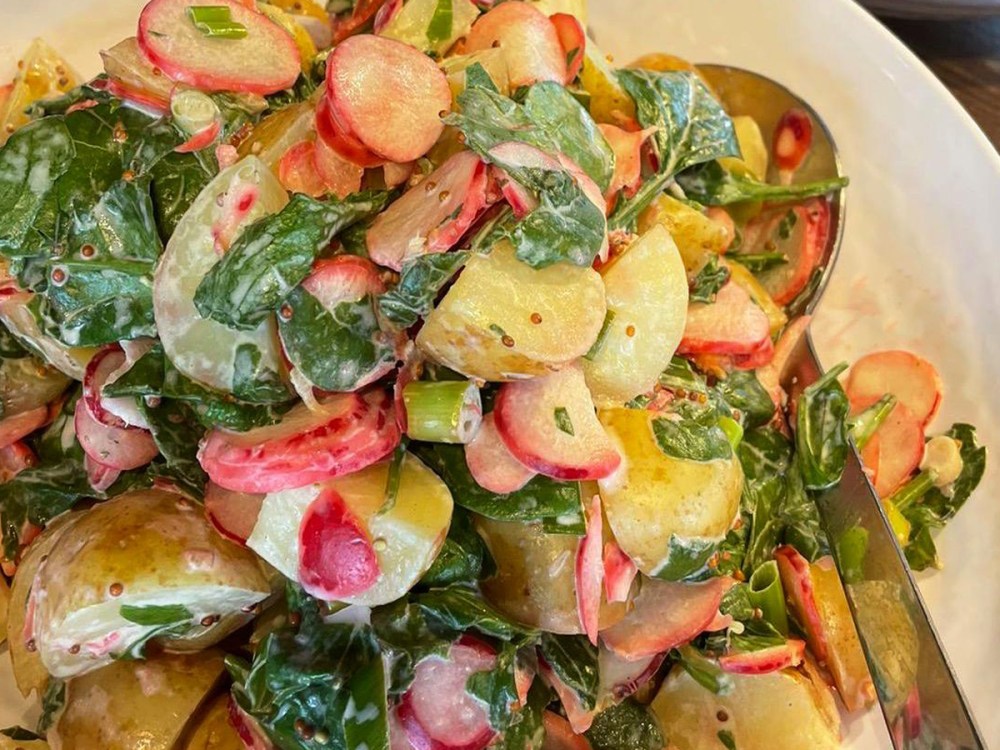 An image showing our new potatoes, radish and spring onion salad option